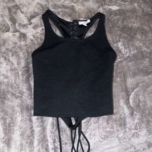 XS tank top, ties in the back.